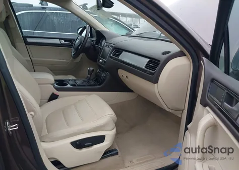 2014 Volkswagen Touareg 3.6L Sport z USA, uszkodzony, nr VIN WVGEF9BP7ED001676